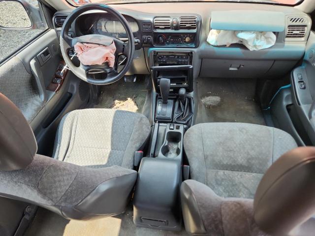 Photo 8 from auction – 1999 HONDA PASSPORT E with VIN 4S6CM58W1X4403546