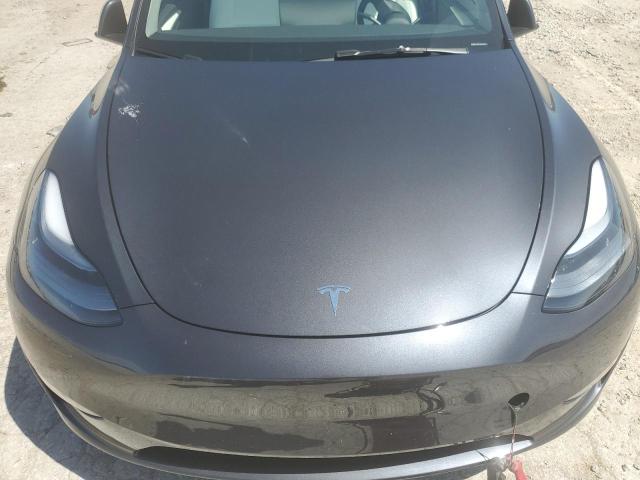 Photo 11 from auction – 2025 TESLA MODEL Y with VIN 7SAYGDEE5SA342154