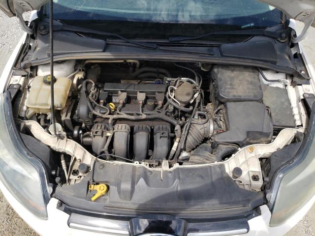 Photo 11 from auction – 2014 FORD FOCUS TITA with VIN 1FADP3J27EL410062