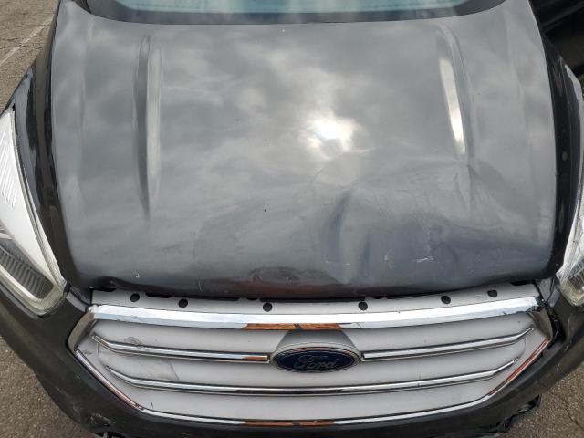 Photo 12 from auction – 2018 FORD ESCAPE with VIN 1FMCU9J91JUB30913