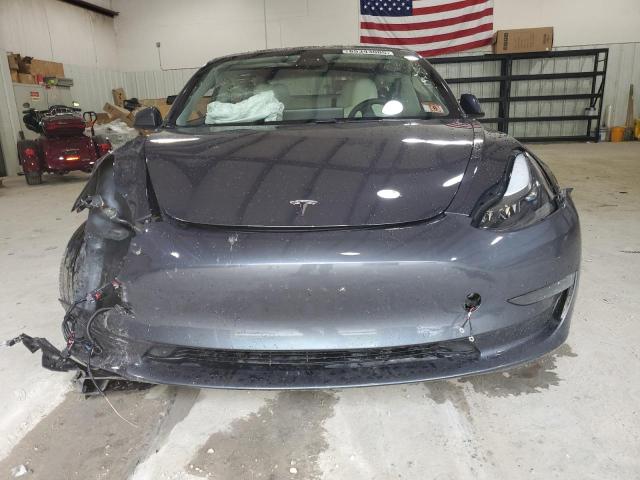 Photo 5 from auction – 2021 TESLA MODEL 3 with VIN 5YJ3E1EB2MF974231
