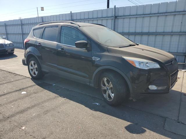 Photo 4 from auction – 2016 FORD ESCAPE SE with VIN 1FMCU9G92GUC17915