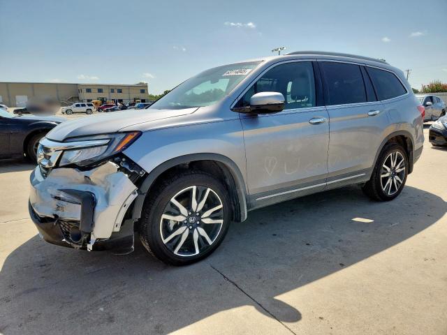 HONDA PILOT TOURING 2022 with VIN 5FNYF6H98NB002014 - Photo from auction