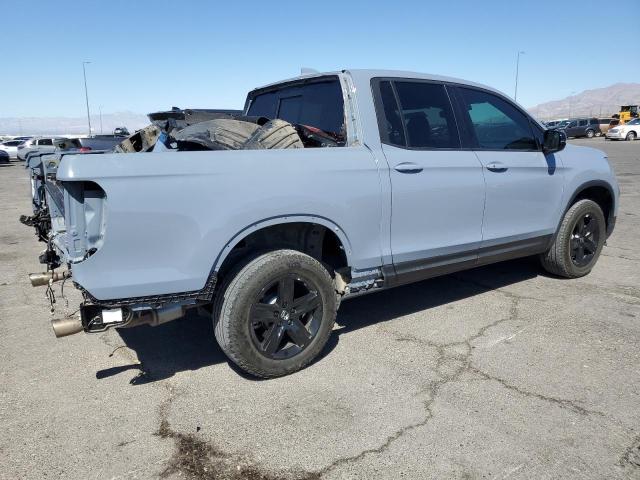 Photo 3 from auction – 2022 HONDA RIDGELINE with VIN 5FPYK3F8XNB032692
