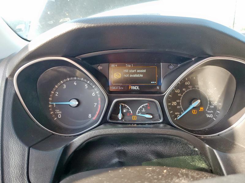 Photo 9 from auction – 2015 FORD FOCUS SE with VIN 1FADP3F21FL261013