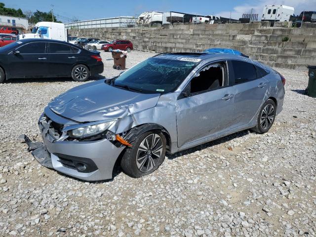 HONDA CIVIC EX 2016 with VIN 2HGFC1F35GH653052 - Photo from auction