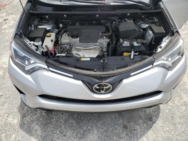 Photo 12 from auction – 2018 TOYOTA RAV4 LE with VIN 2T3ZFREV3JW510452