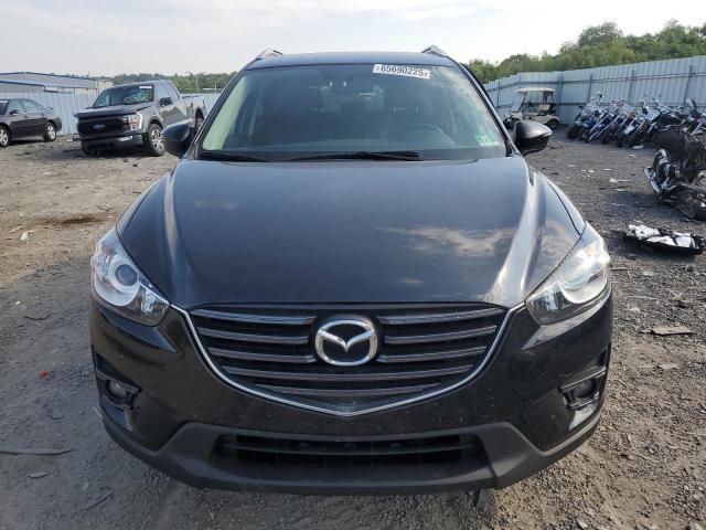 Photo 5 from auction – 2016 MAZDA CX-5 GT with VIN JM3KE4DY4G0892210