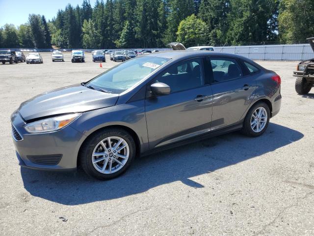 FORD FOCUS SE 2018 with VIN 1FADP3F21JL202200 - Photo from auction