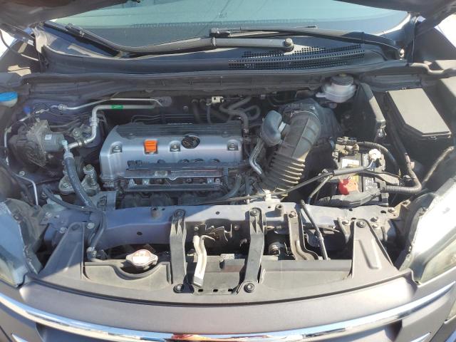 Photo 12 from auction – 2014 HONDA CRV with VIN 2HKRM3H71EH542278