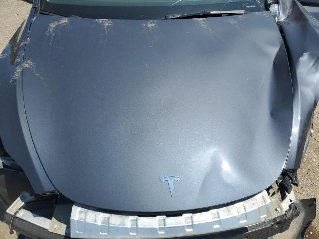 Photo 11 from auction – 2022 TESLA MODEL Y with VIN 7SAYGAEE8NF506597