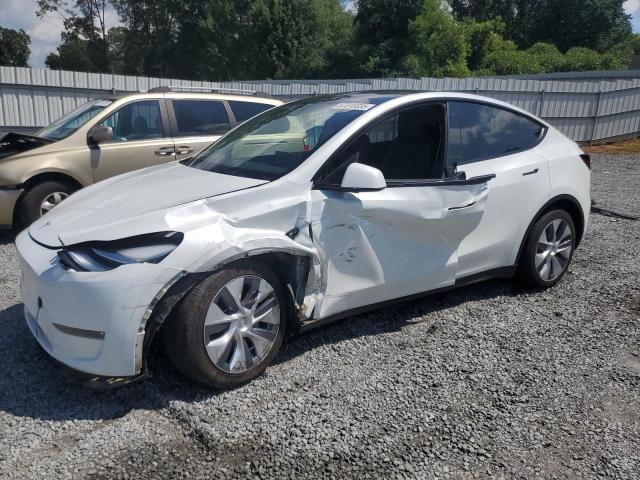 TESLA MODEL Y 2023 with VIN 7SAYGDEE9PA099570 - Photo from auction
