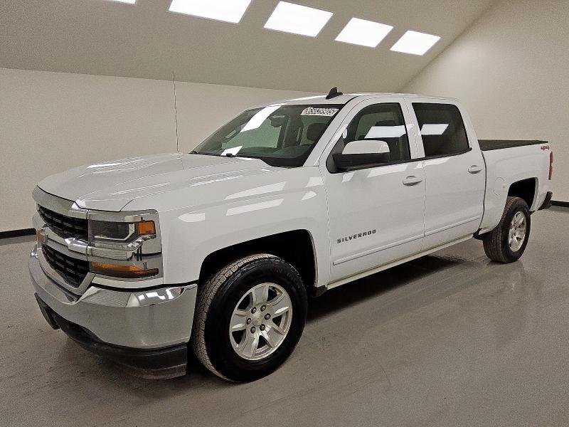 CHEVROLET SILVERADO 2018 with VIN 3GCUKREC1JG134905 - Photo from auction