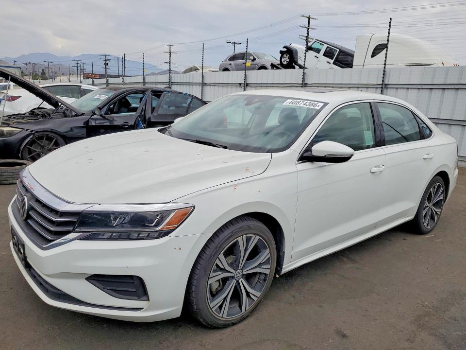 VOLKSWAGEN PASSAT 2022 with VIN 1VWSA7A3XNC004258 - Photo from auction