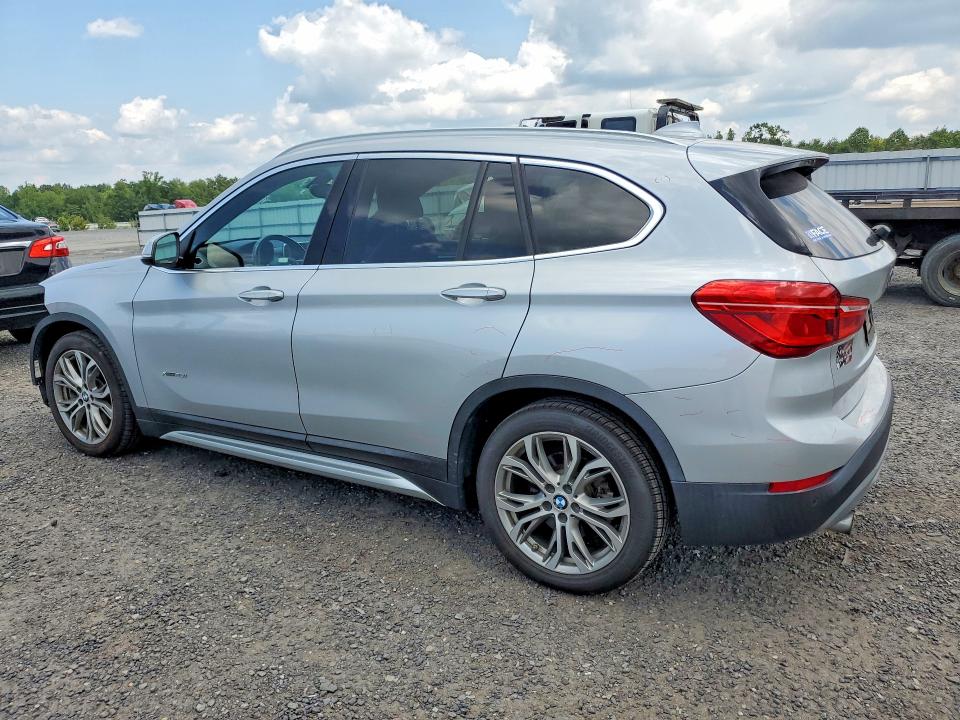Photo 2 from auction – 2017 BMW X1 with VIN WBXHT3Z31H4A57942