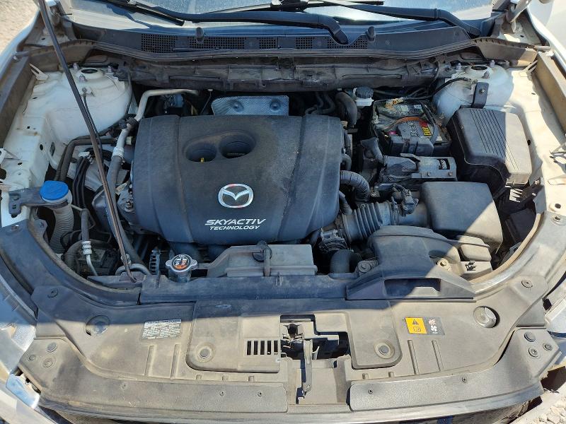 Photo 12 from auction – 2015 MAZDA CX-5 with VIN JM3KE2CYXF0534260