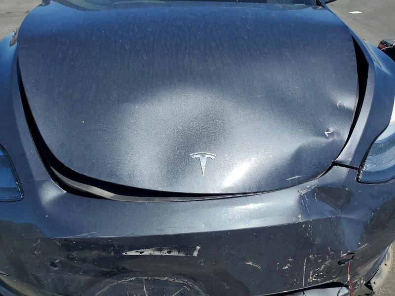Photo 11 from auction – 2024 TESLA MODEL Y with VIN 7SAYGDED6RF230449