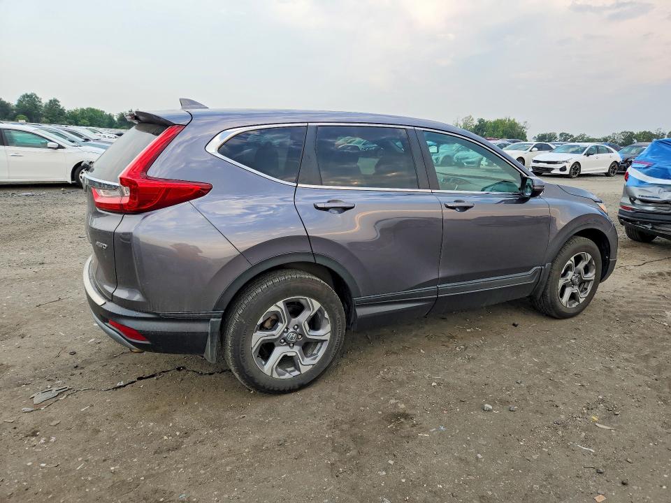 Photo 3 from auction – 2018 HONDA CR-V with VIN 7FARW2H84JE082642