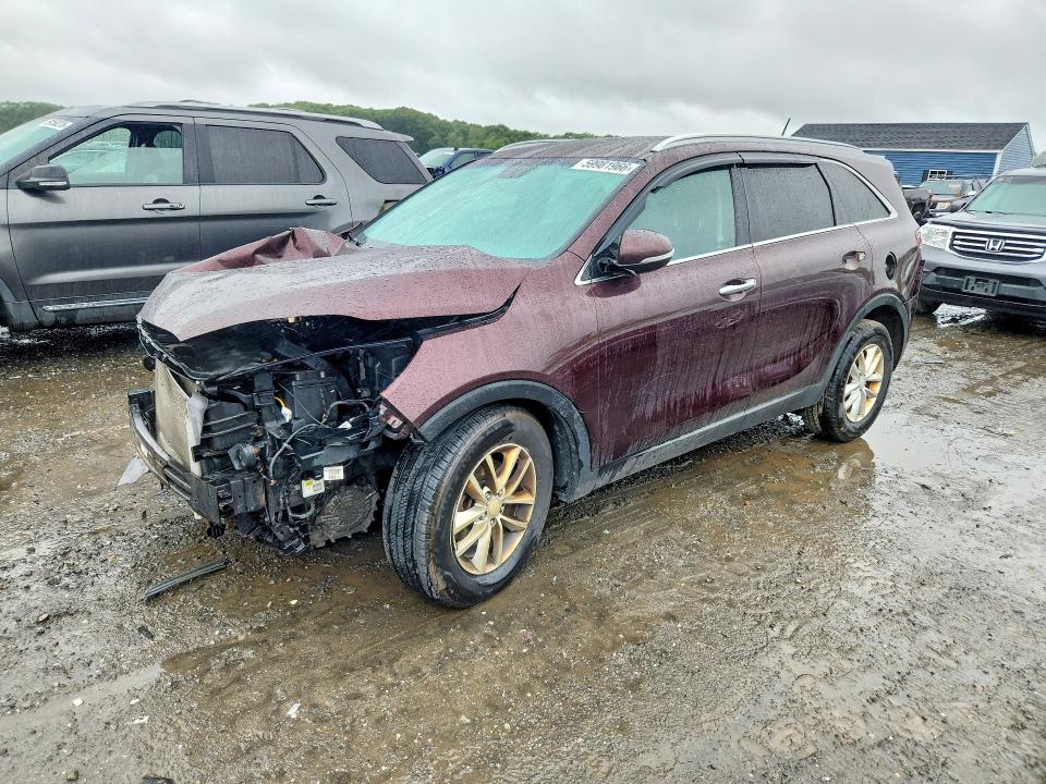 KIA SORENTO 2016 with VIN 5XYPG4A37GG076989 - Photo from auction