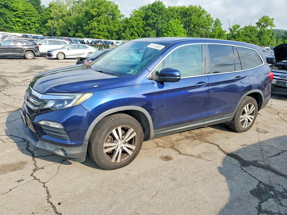HONDA PILOT 2017 with VIN 5FNYF6H59HB077757 - Photo from auction