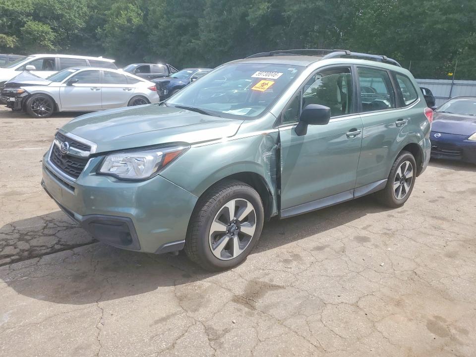 SUBARU FORESTER 2017 with VIN JF2SJABCXHH561520 - Photo from auction