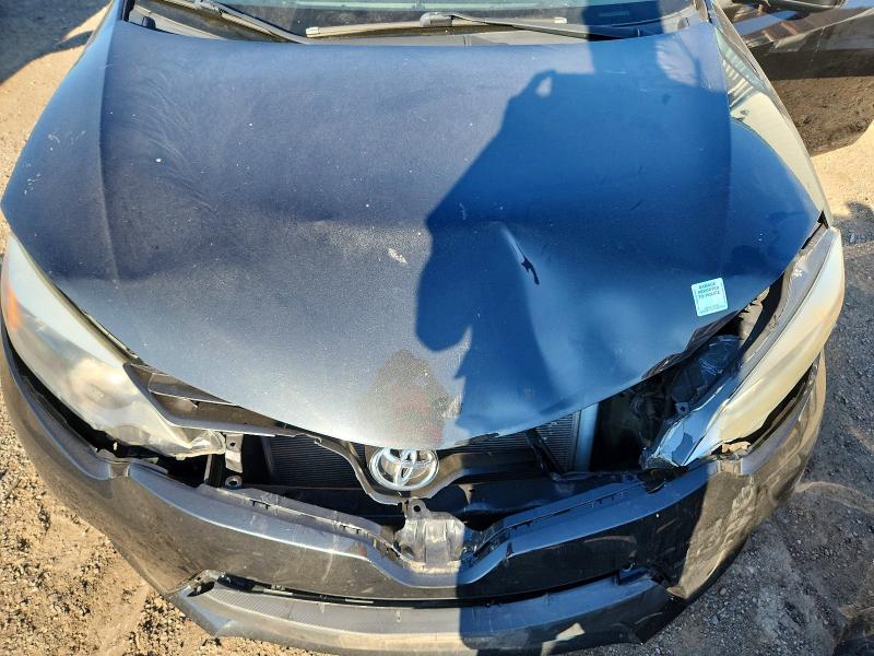 Photo 11 from auction – 2014 TOYOTA COROLLA with VIN 2T1BURHE3EC165488