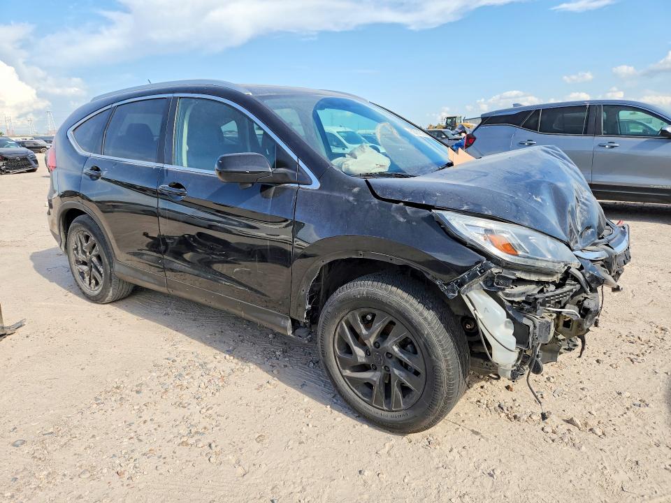 Photo 4 from auction – 2016 HONDA CR-V with VIN 2HKRM3H78GH561445