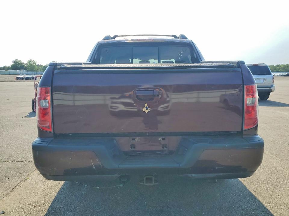 Photo 6 from auction – 2013 HONDA RIDGELINE with VIN 5FPYK1F51DB002652