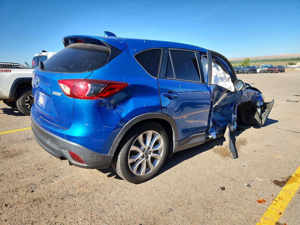 Photo 3 from auction – 2014 MAZDA CX-5 with VIN JM3KE4DY3E0303001