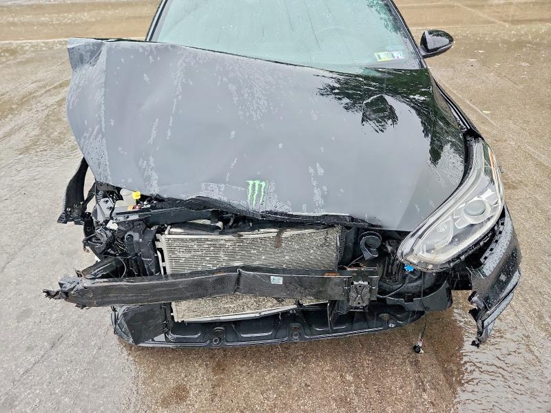 Photo 11 from auction – 2021 KIA FORTE with VIN 3KPF34AD8ME390935