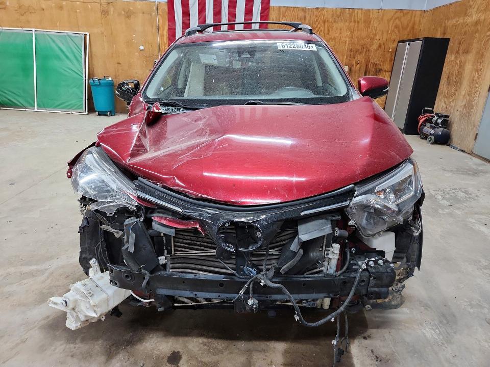 Photo 5 from auction – 2018 TOYOTA RAV4 HV with VIN JTMDJREV9JD176045