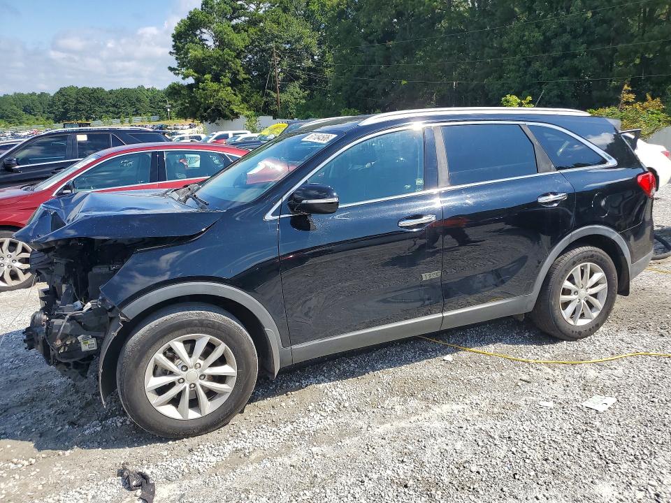 KIA SORENTO 2016 with VIN 5XYPG4A37GG090469 - Photo from auction