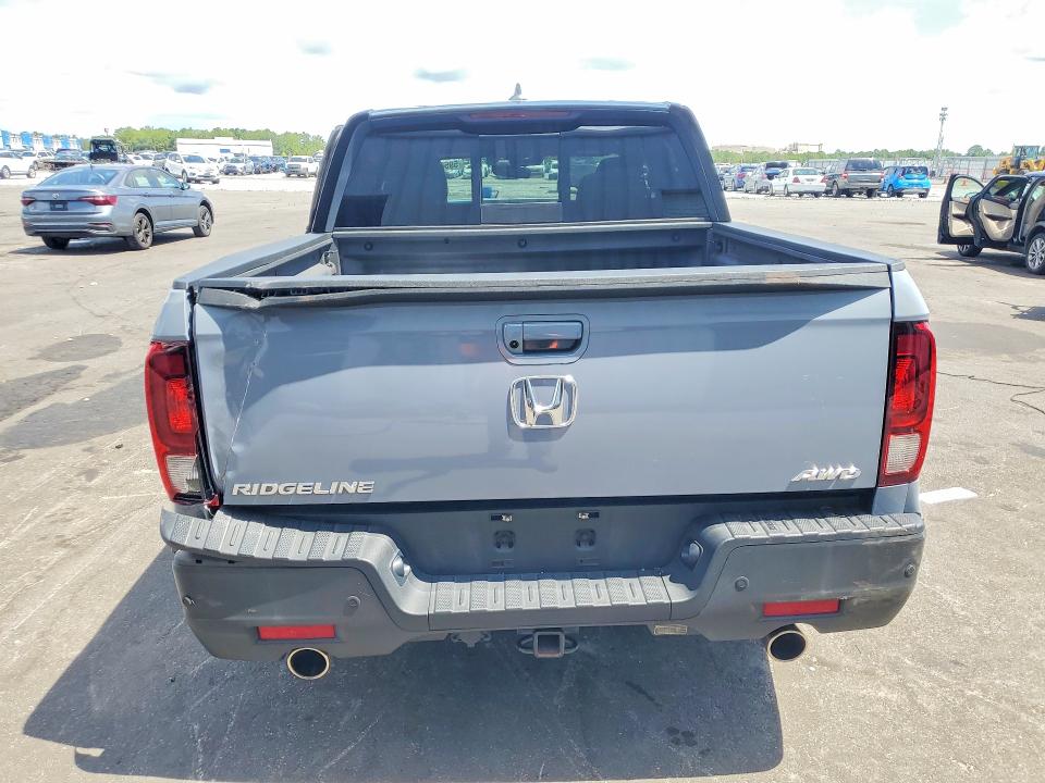Photo 6 from auction – 2023 HONDA RIDGELINE with VIN 5FPYK3F85PB054442