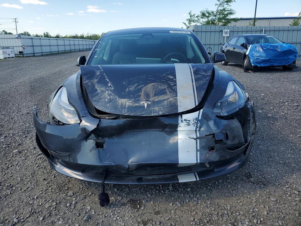 Photo 5 from auction – 2023 TESLA MODEL 3 with VIN 5YJ3E1EA9PF407106