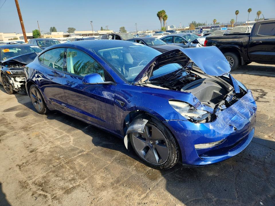 Photo 4 from auction – 2022 TESLA MODEL 3 with VIN 5YJ3E1EB8NF261271