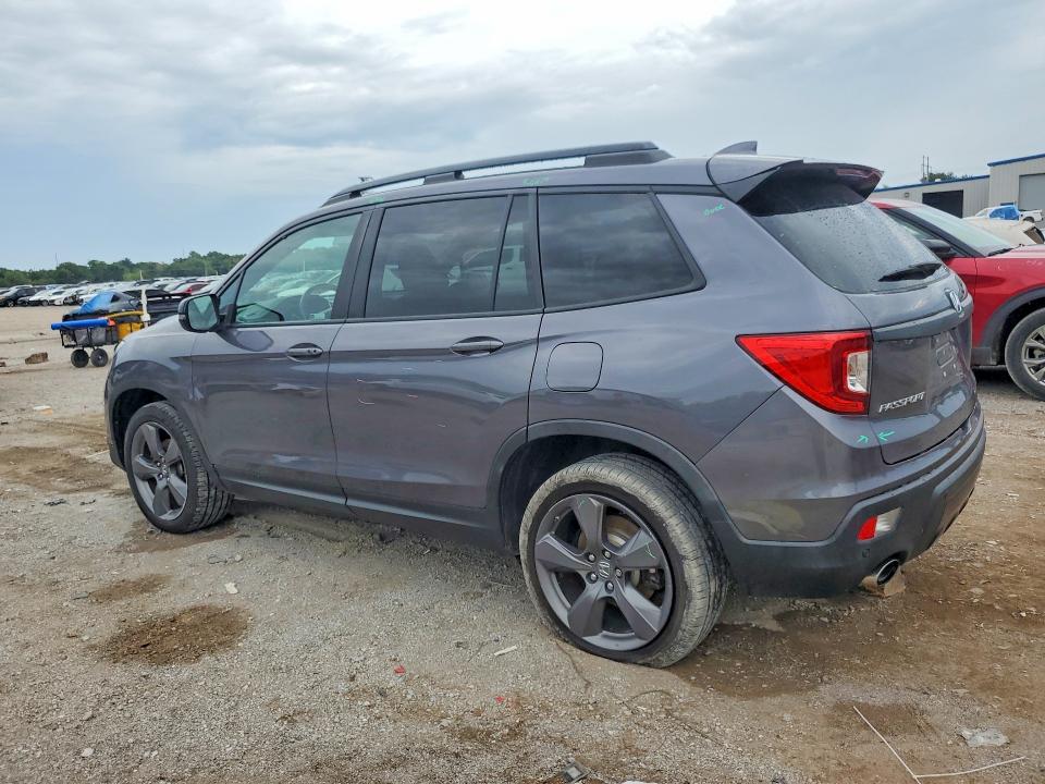 Photo 2 from auction – 2021 HONDA PASSPORT with VIN 5FNYF8H94MB020973