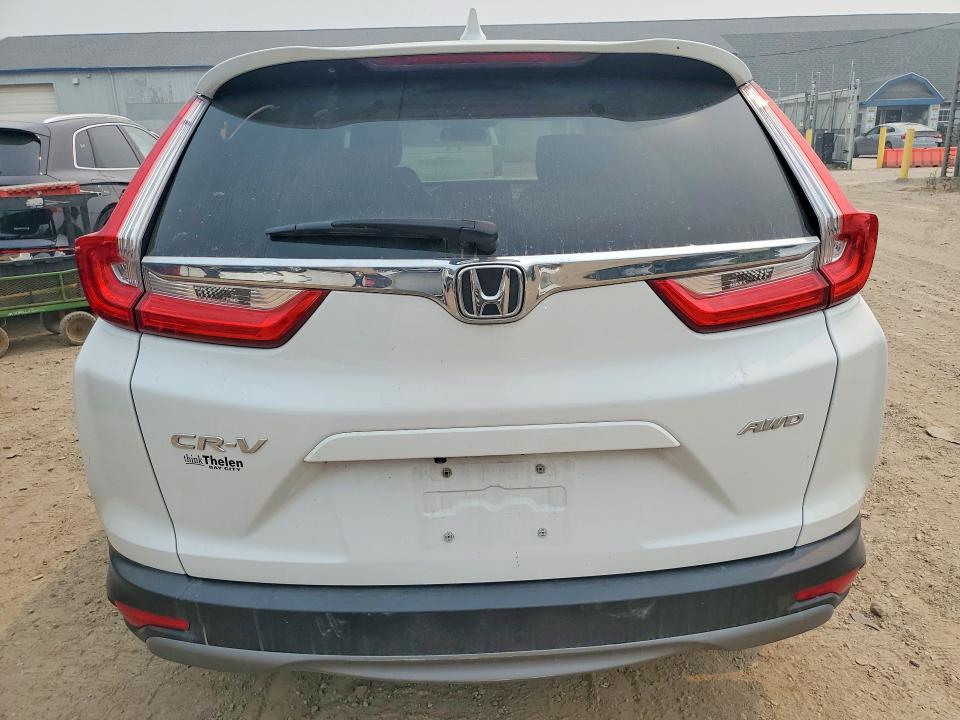 Photo 6 from auction – 2019 HONDA CR-V with VIN 2HKRW2H54KH663272