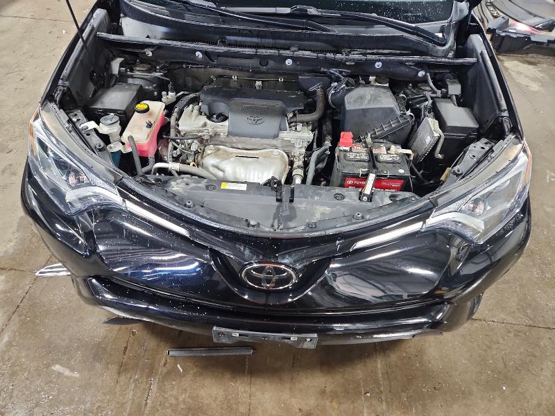 Photo 12 from auction – 2018 TOYOTA RAV4 with VIN 2T3RFREV7JW822760