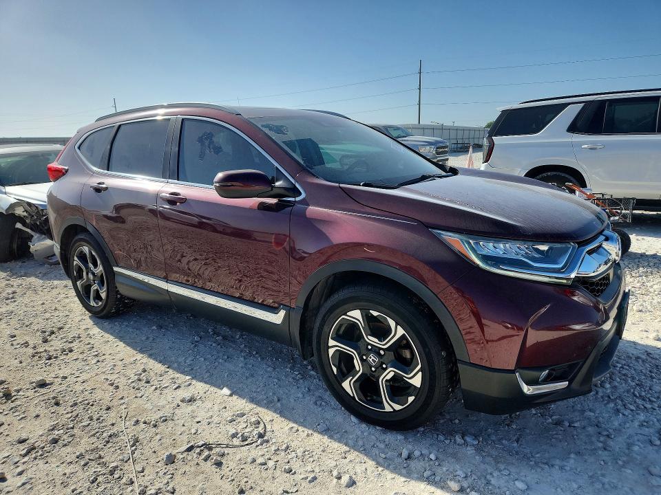Photo 4 from auction – 2017 HONDA CR-V with VIN 5J6RW1H90HL007243