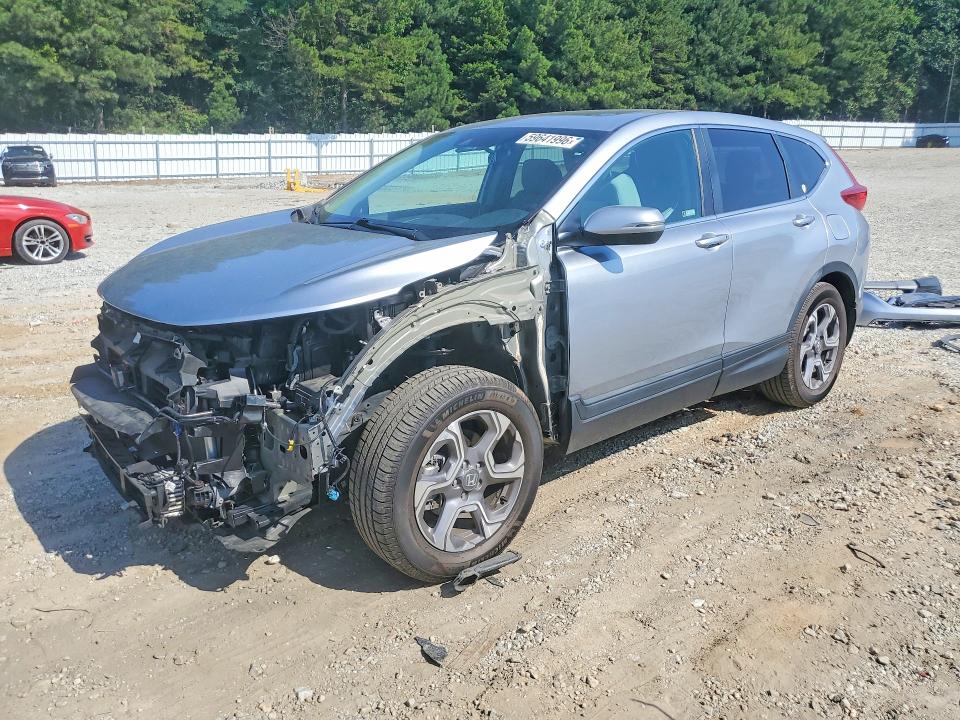 Photo 1 from auction – 2018 HONDA CR-V with VIN 7FARW2H56JE088528