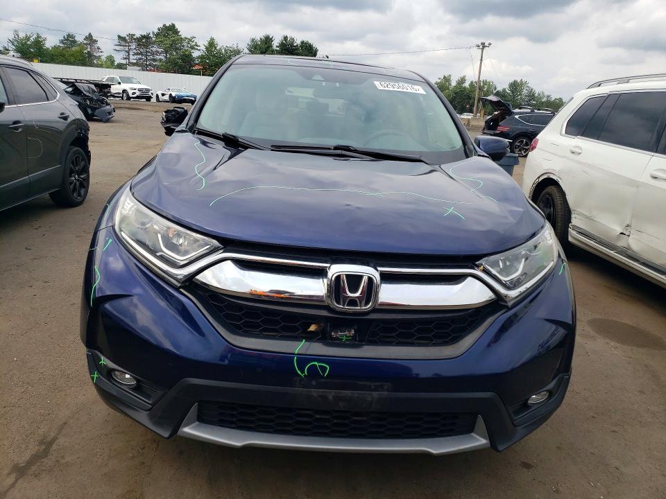 Photo 5 from auction – 2018 HONDA CR-V with VIN 7FARW2H54JE063949