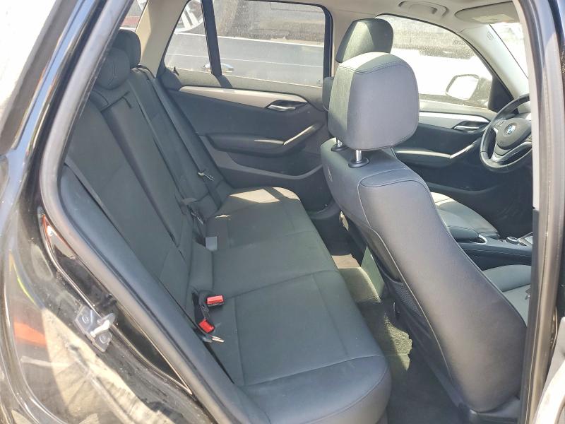 Photo 11 from auction – 2013 BMW X1 with VIN WBAVM1C57DVW46309