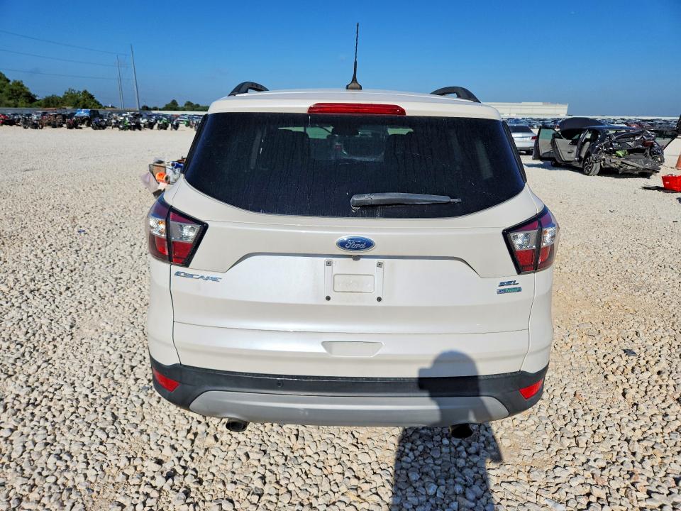 Foto 6 de la subasta – 2018 FORD ESCAPE con VIN 1FMCU0HD1JUD20216