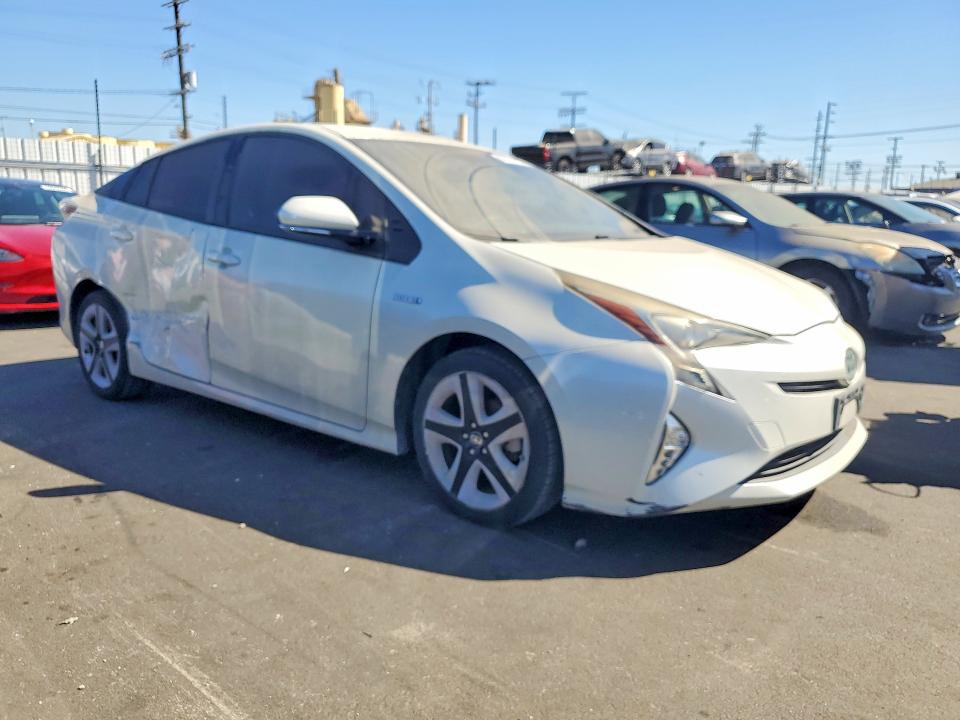 Photo 4 from auction – 2016 TOYOTA PRIUS with VIN JTDKARFUXG3507680