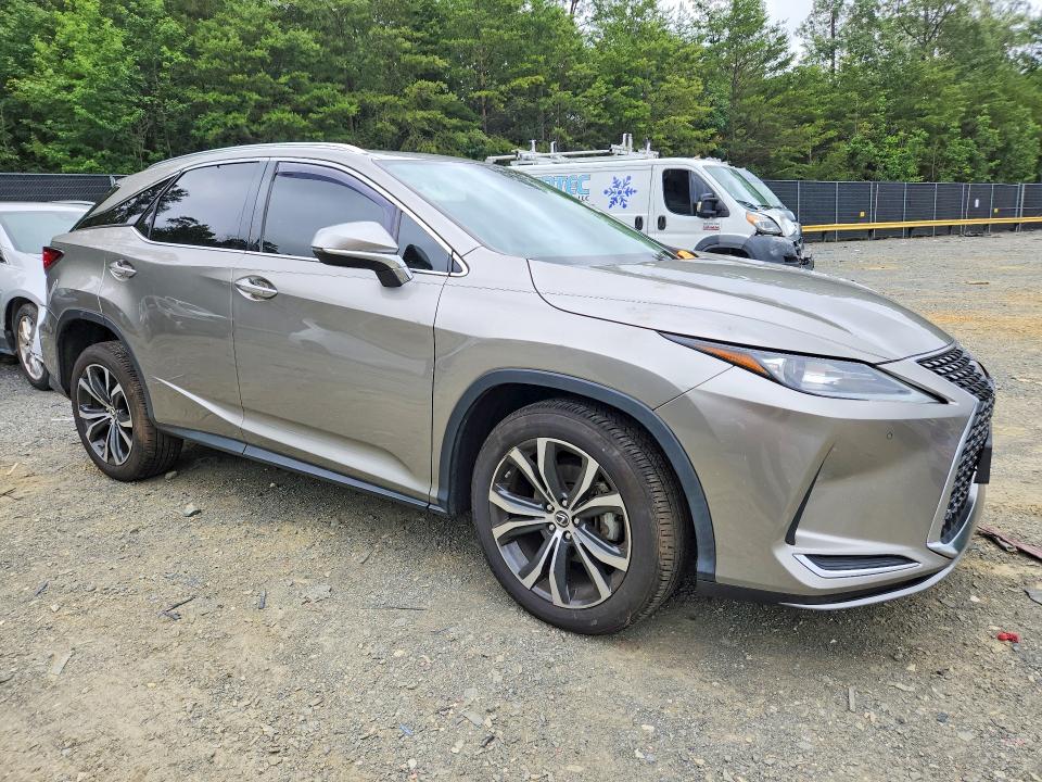 Photo 4 from auction – 2021 LEXUS RX with VIN 2T2HZMDA9MC295349