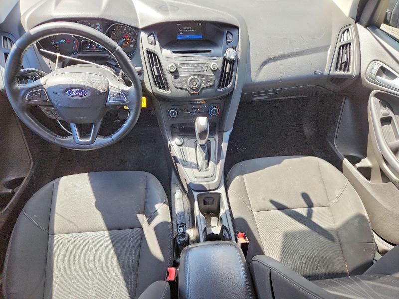 Photo 8 from auction – 2016 FORD FOCUS with VIN 1FADP3F28GL347016