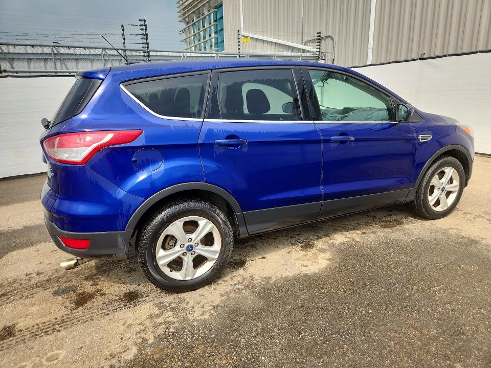 Photo 3 from auction – 2014 FORD ESCAPE with VIN 1FMCU9GX1EUC55261
