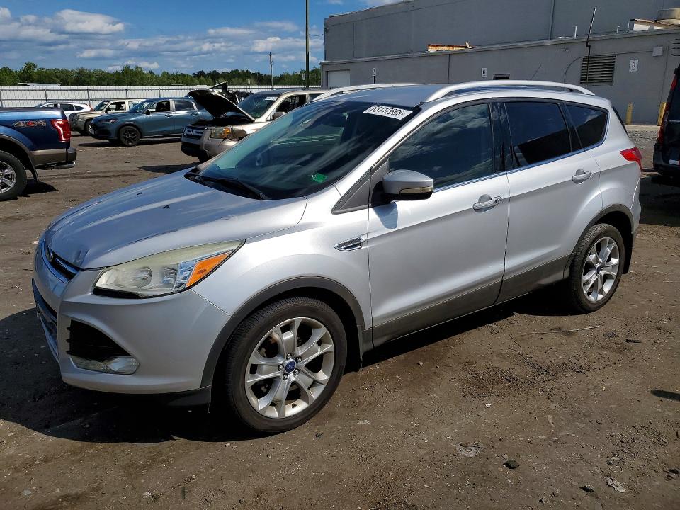 FORD ESCAPE 2014 with VIN 1FMCU0JX5EUB34043 - Photo from auction