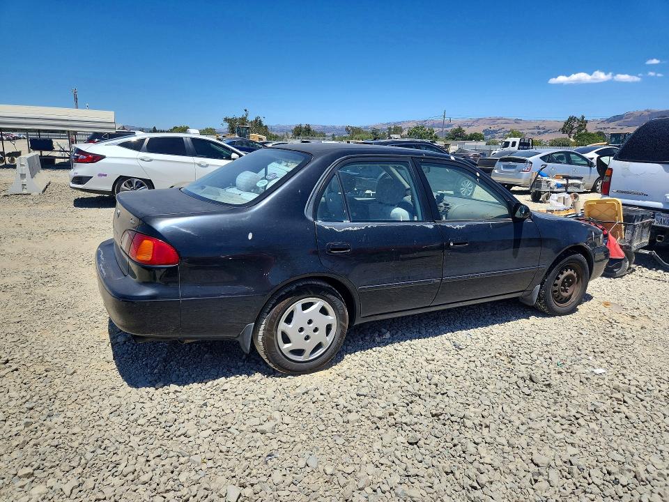 Foto 3 de la subasta – 2000 TOYOTA COROLLA con VIN 1NXBR12E4YZ393319