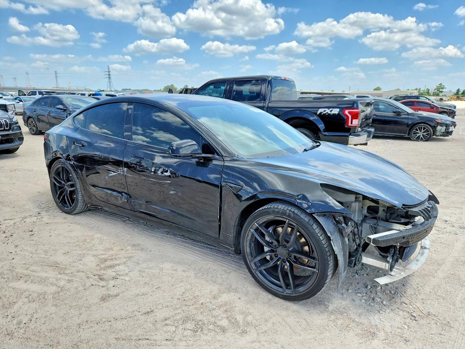 Photo 4 from auction – 2021 TESLA MODEL 3 with VIN 5YJ3E1EA0MF143740